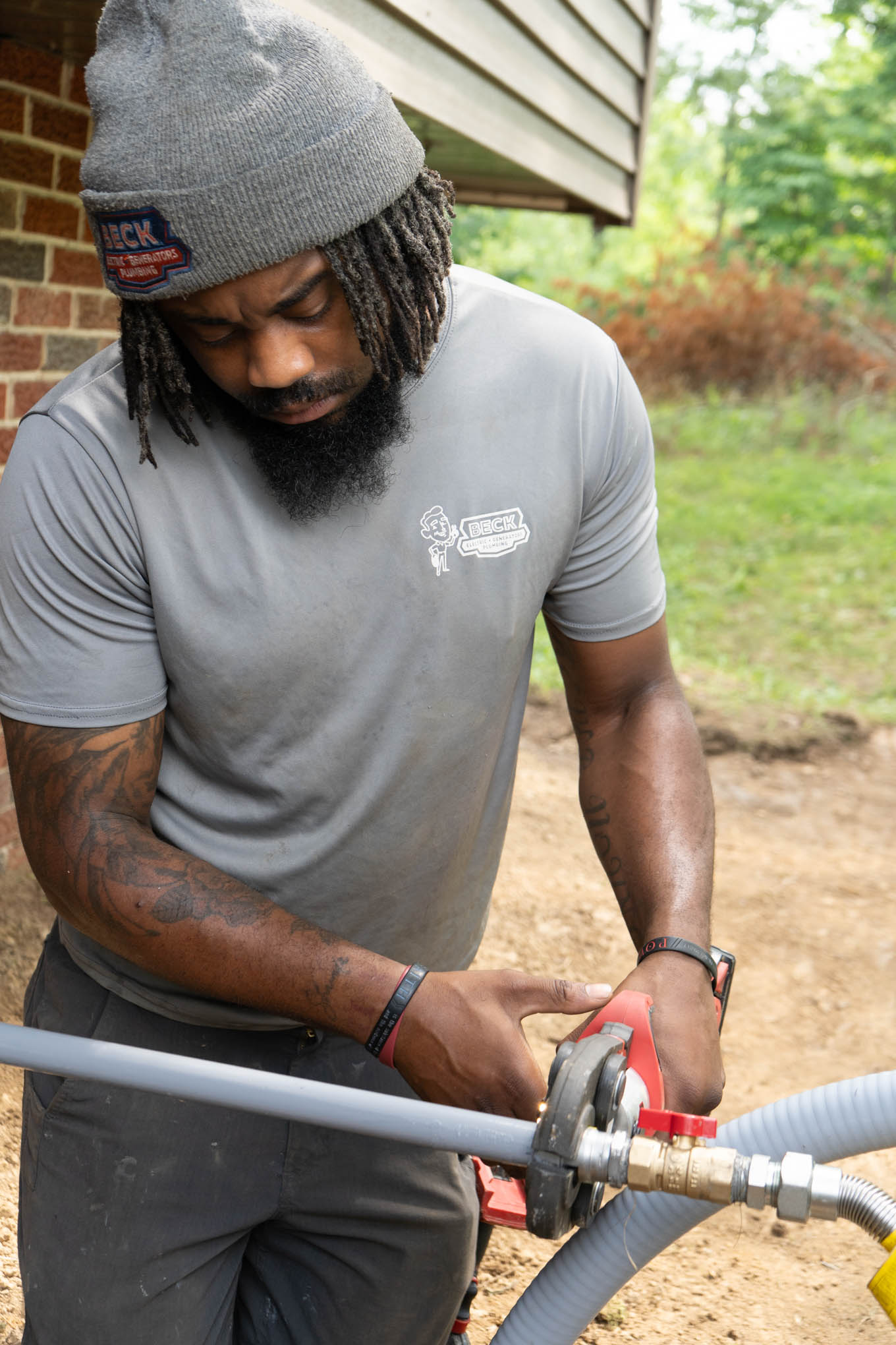 Beck Electric, Generators & Plumbing Plumber installing gas line for standby Generator